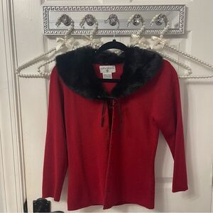 Red button down cardigan with black fur trim
